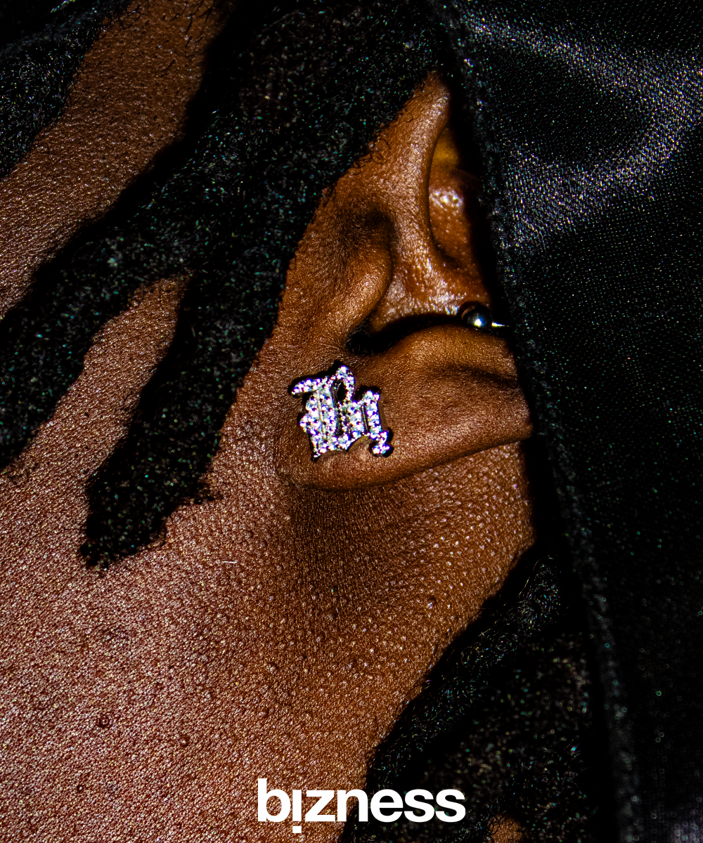 SILVER EVIL EARRINGZ