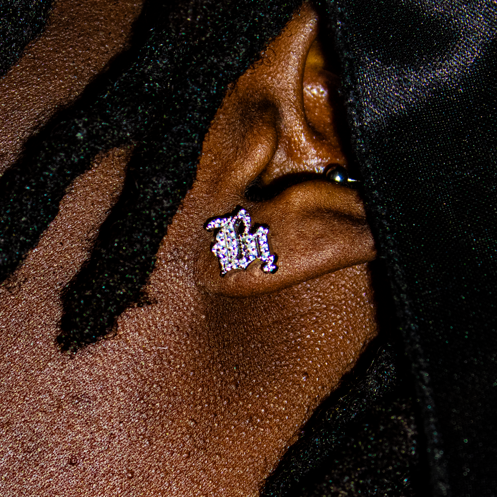 SILVER EVIL EARRINGZ